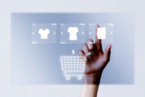 Person adding clothes to cart closeup for online shopping campaign